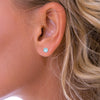 Blue Topaz Claw-Set Stud Earrings in Silver