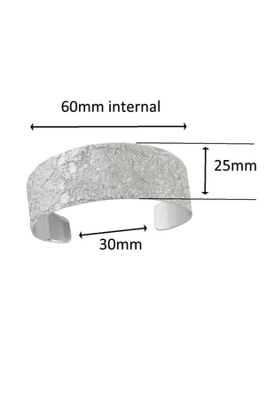 Silver textured lunar surface cuff bangle